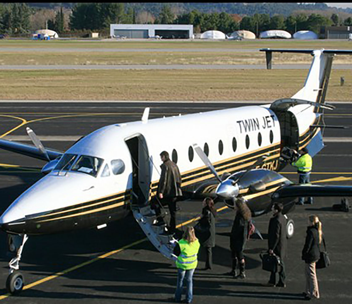 Beech 1900 cargo charter aircraft with passengers
