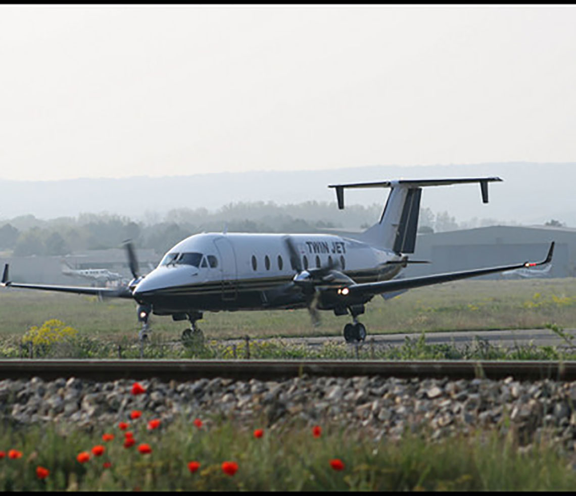 Beech 1900 cargo charter aircraft on runway