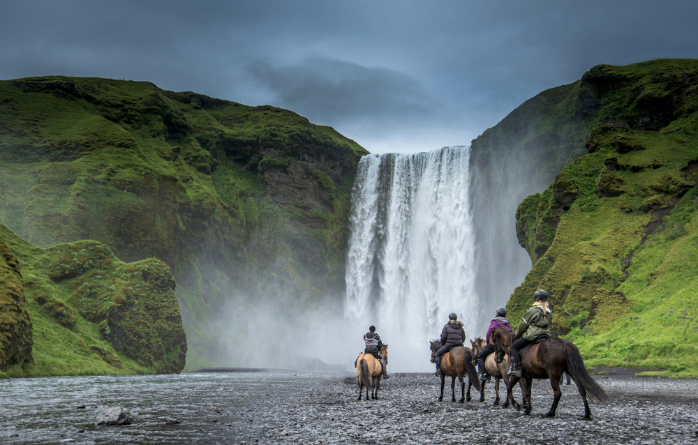 Horseriding near waterfall